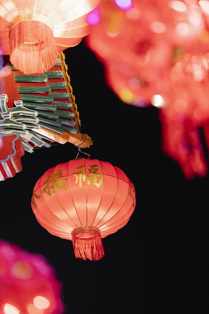 Low angle of traditional Chinese lanterns for traditional festival hanging against night sky